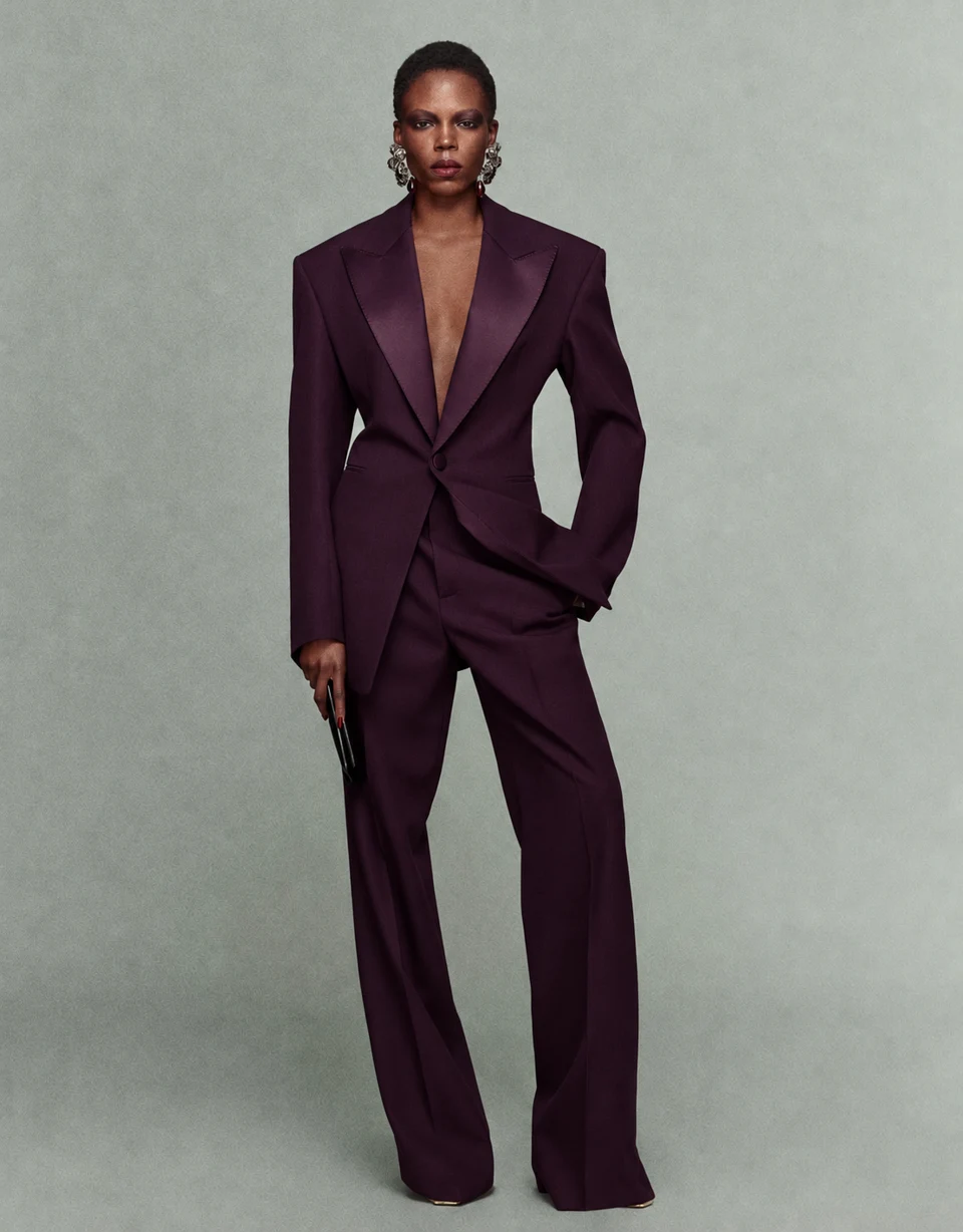 Plum trouser suit with a shaped single-button jacket and satin peak lapels